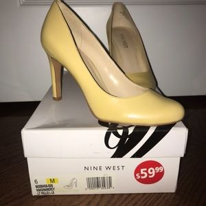 Nine West yellow leather pumps!